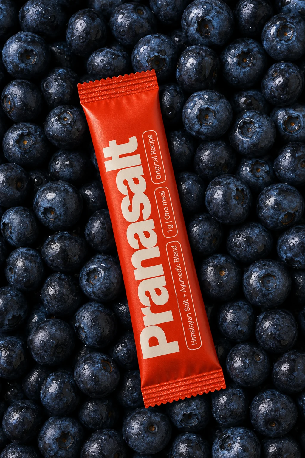 A Pranasalt sachet in a flatlay with blueberries